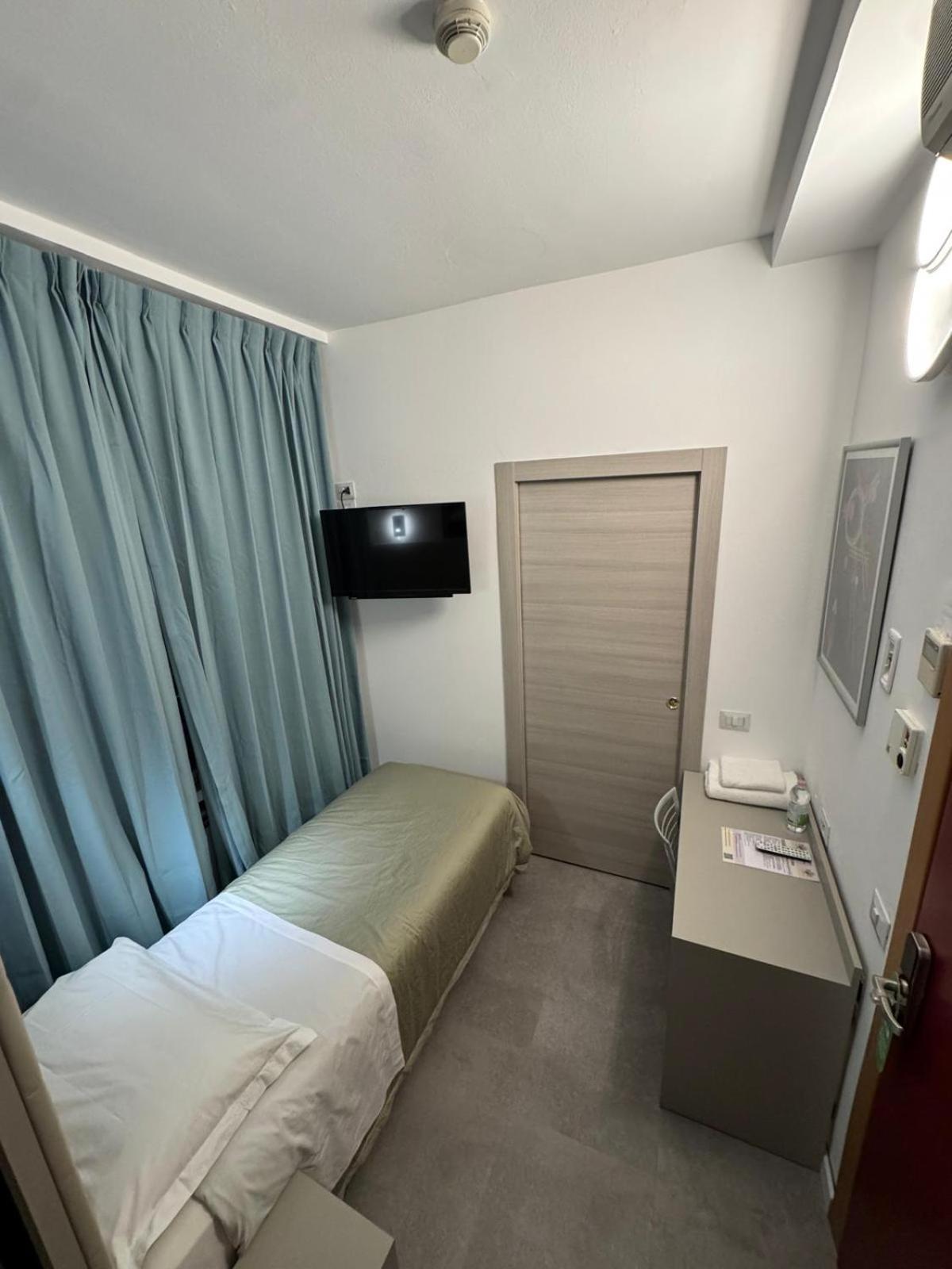 Hotel Parma Milão Quarto foto